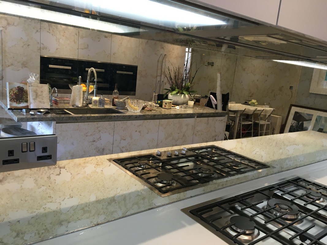 Mirror glass splashback in Archway luxury kitchen